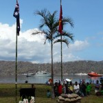 14 September 2014 Centenary Service for AE1 in Rabaul. HMAS Yarra visible in harbour