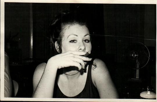 Penny Shaw smokin' cigars