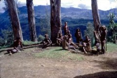 Yarramanda villagers resting on the side of a deep gorge dividing Baiyer River and Lumusa - looking towards Enga Province