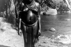 A young woman at the Nebilyer river - note that the glistening pig fat emphasises her dark skin