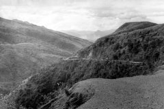 The road through the treacherous Baiyer Pass with one of the frequent landslides at centre